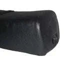 Vespa seat saddle black side close-up with textured finish and rounded end