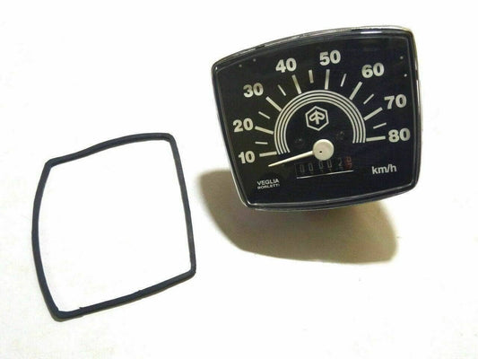 Vespa speedometer by Piaggio featuring a black face and clear lens design