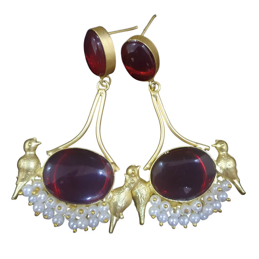 Vintage bird dangle earrings with gold accents and red stones, adorned with pearls for a classic look
