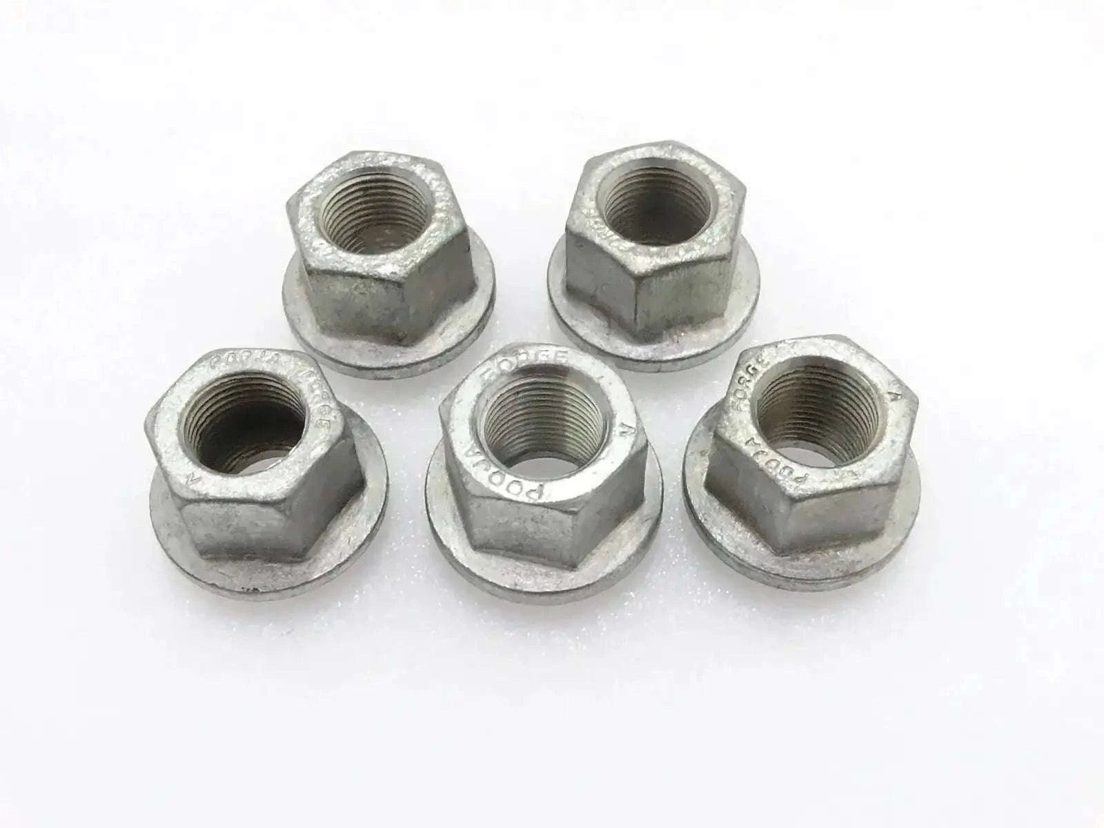 Set of five silver metal hex wheel nuts with threaded bores