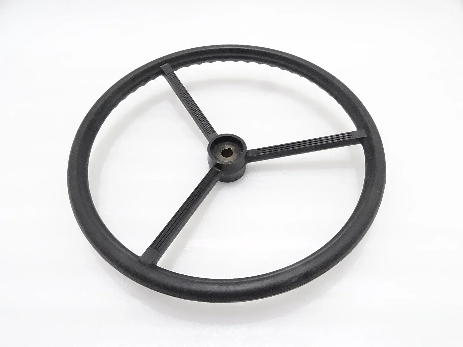 Black wheel steering key way, made of durable material, ideal for tractors and machinery accessories