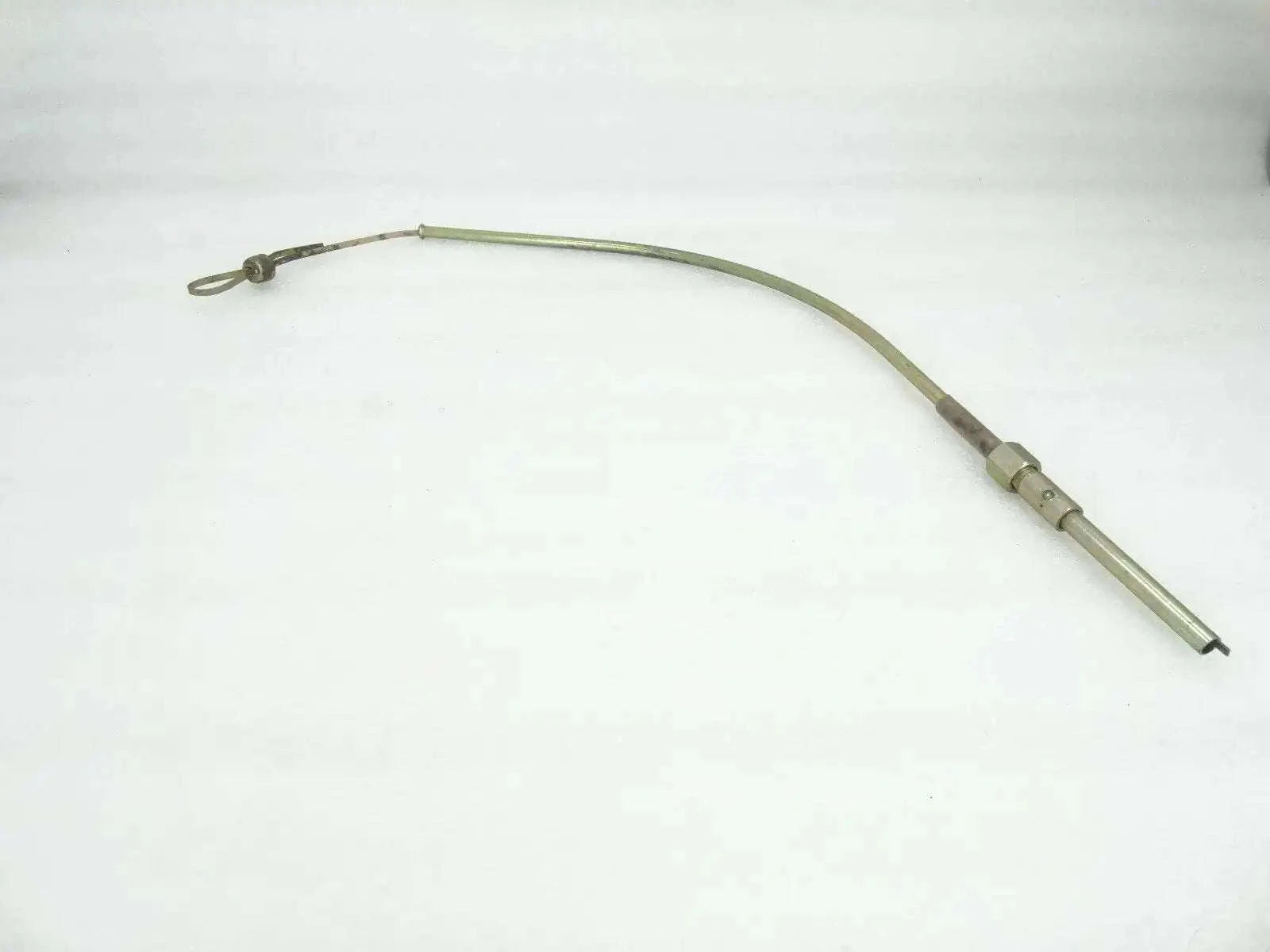 Engine oil dipstick gauge tube with loop handle and connector