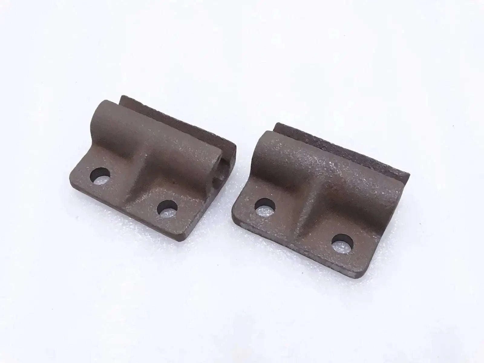 Tailgate door hinges, dark metal with bolt holes