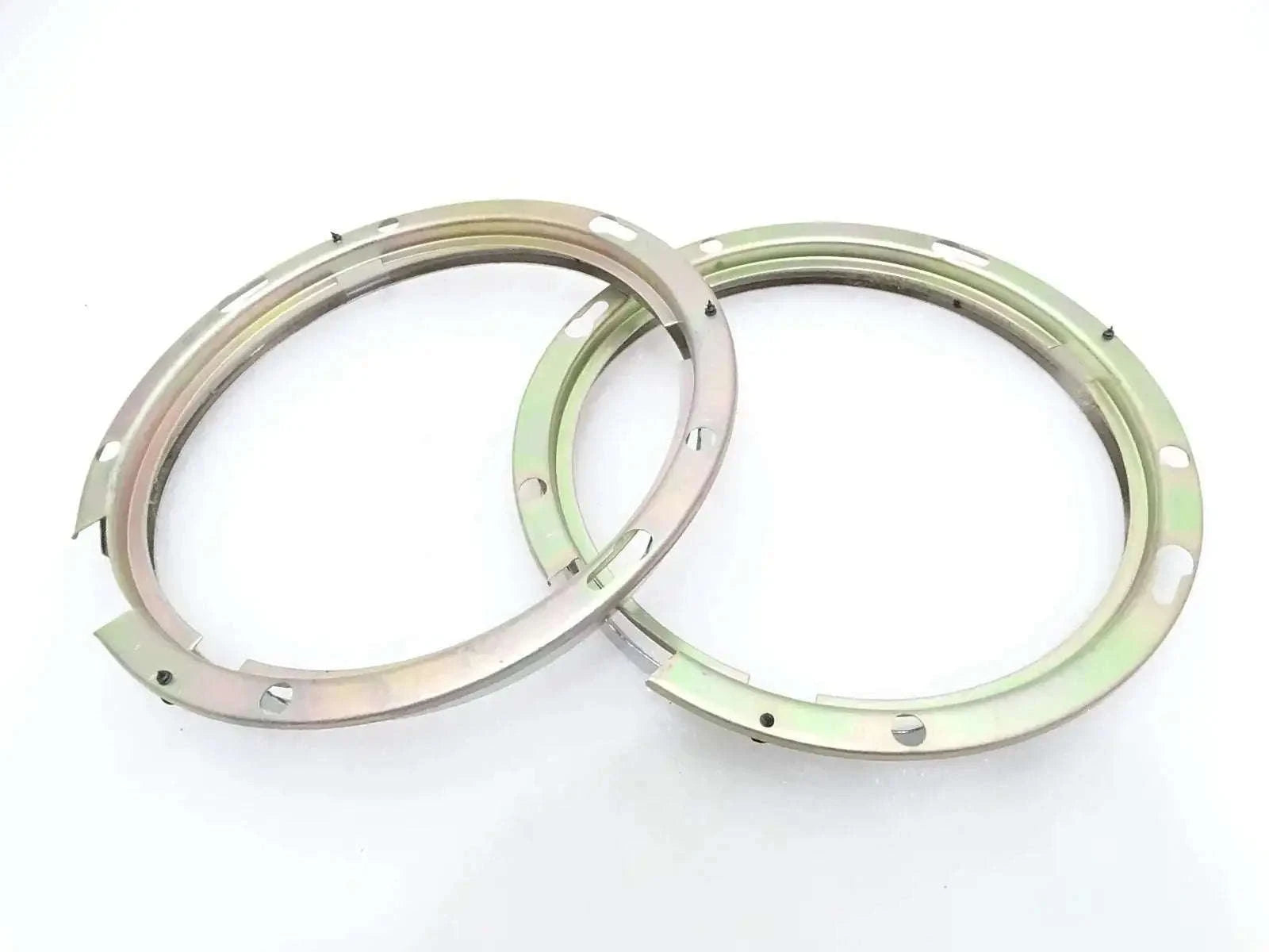 Headlight bezel retaining rings, 7-inch pair, silver metal with mounting holes