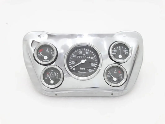 Chrome speedometer mounting plate with four gauges and illuminated dials