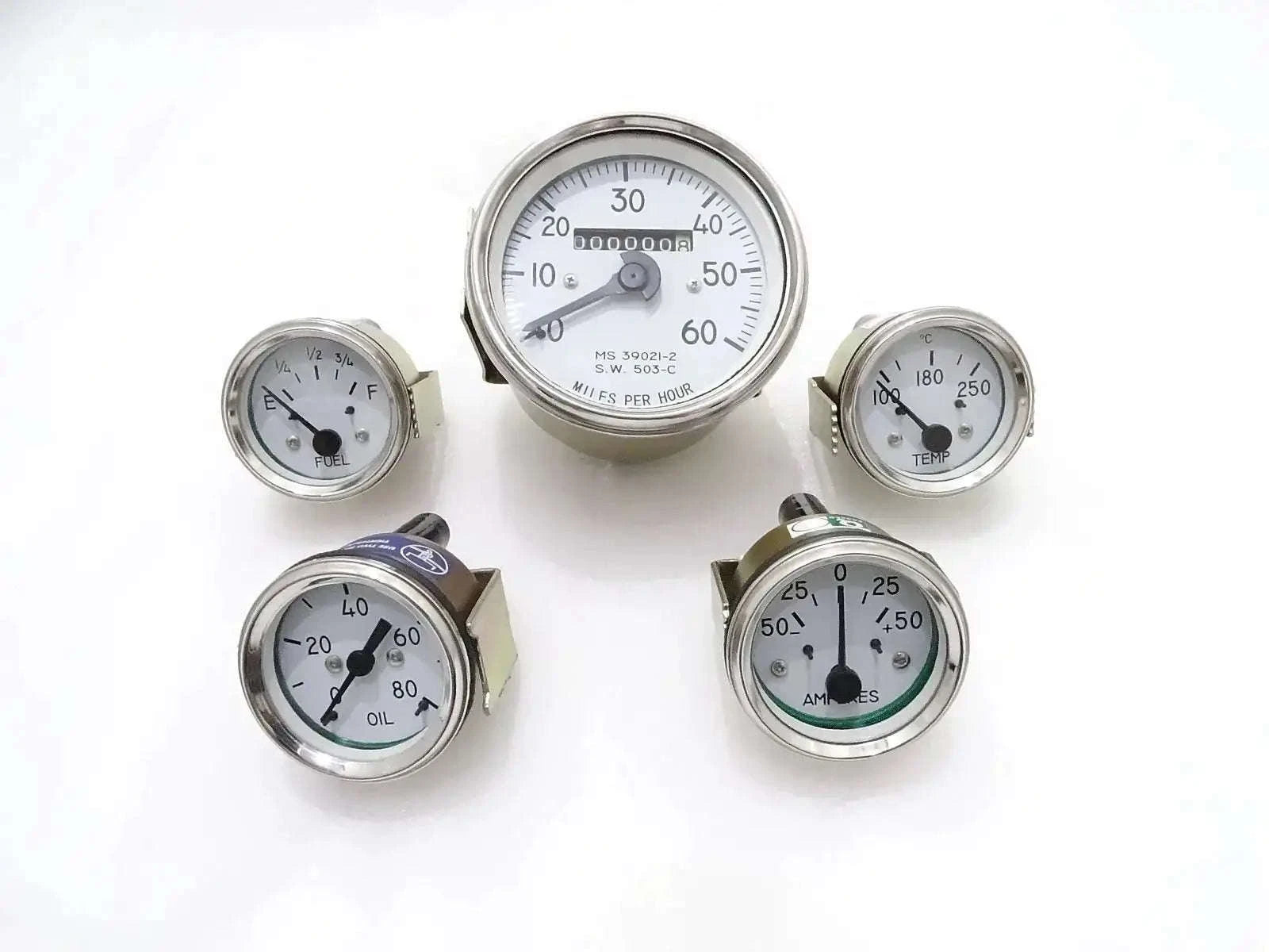 Round analog gauge kit with white faces, speedometer, oil, temp, fuel, amp indicators