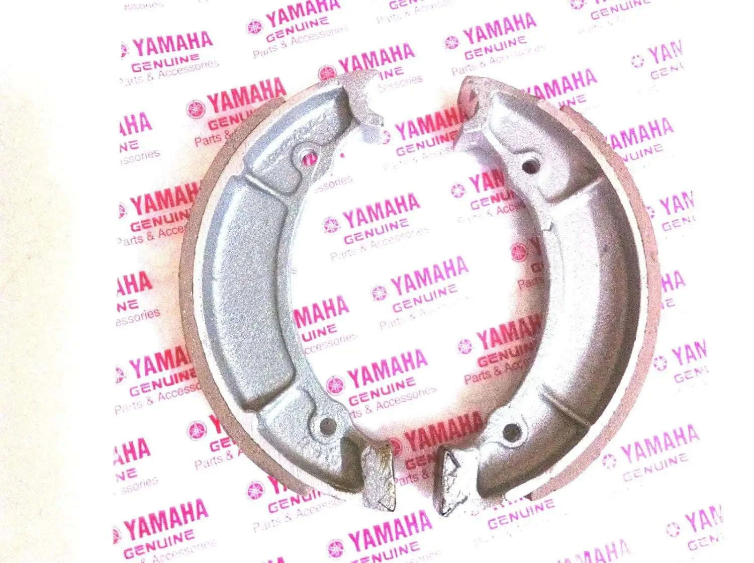 Yamaha rear brake shoes with metal backing plates