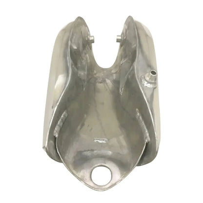 Polished aluminum fuel tank cover with circular outlet hole and mounting tabs